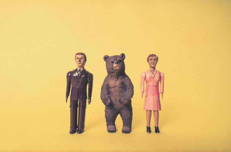 Toy Man, Woman & Bear Free Stock Photo